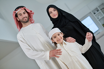 Image showing Portrait of young arabian muslim family wearing traditional clothes