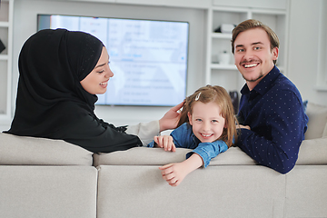 Image showing Happy Muslim family spending time together in modern home
