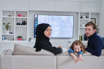 Image showing Happy Muslim family spending time together in modern home