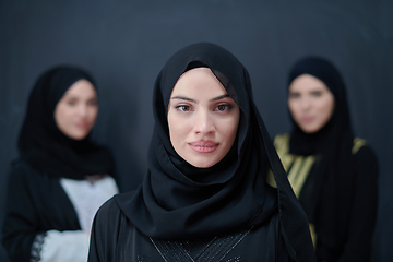 Image showing Portrait of Arab women wearing traditional clothes or abaya