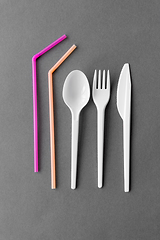 Image showing disposable plastic fork, knife, spoon and straws