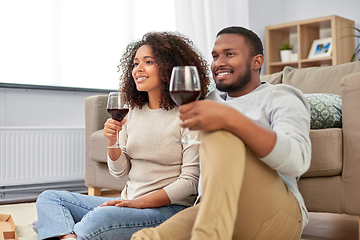 Image showing african american couple drinking wine at home