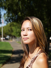 Image showing Outdoor portrait of young asian american woman