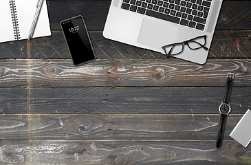 Image showing Wooden office desk mockup top view