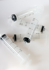 Image showing Syringe on grey background