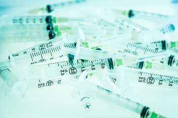 Image showing Syringes on blue background