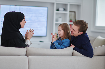 Image showing Happy Muslim family spending time together in modern home