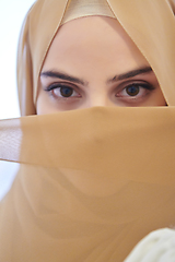 Image showing Portrait of young girl with niqab on face