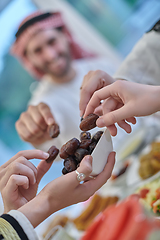 Image showing Muslim family having iftar together during Ramadan.