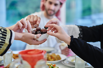 Image showing Muslim family having iftar together during Ramadan.