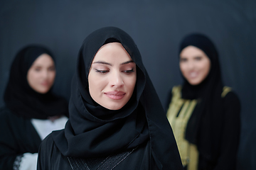 Image showing Portrait of Arab women wearing traditional clothes or abaya