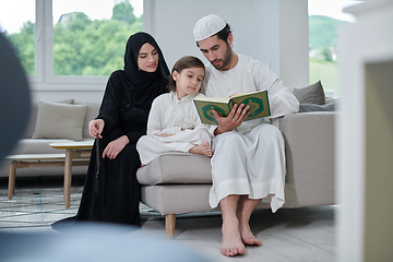 Image showing Young muslim family reading Quran during Ramadan