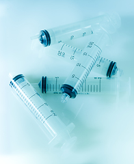 Image showing Syringes on blue background