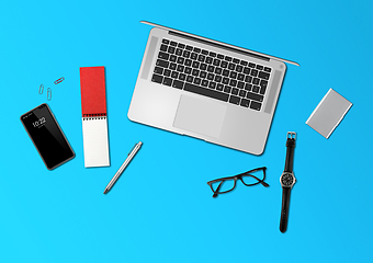 Image showing Office desk mockup top view isolated on blue