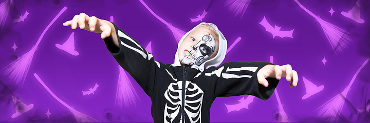 Image showing Little boy like a vampire on scary purple background