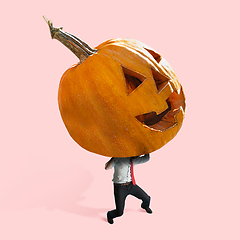 Image showing Scary pumpkin on coral background, the night of fear
