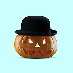 Image showing Scary pumpkin on blue background, the night of fear