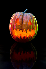 Image showing Halloween pumpkin head jack lantern with scary evil face