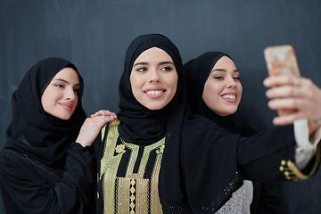 Image showing Portrait of Arab women wearing traditional clothes or abaya