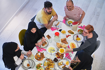 Image showing Top view of muslim family having Iftar during Ramadan holy month