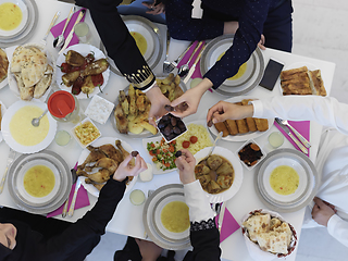 Image showing Top view of Muslim family having iftar together during Ramadan