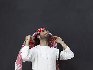 Image showing Portrait of young muslim man wearing traditional clothes