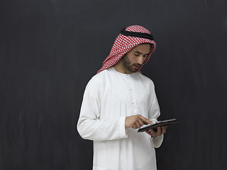 Image showing Portrait of young muslim businessman using tablet
