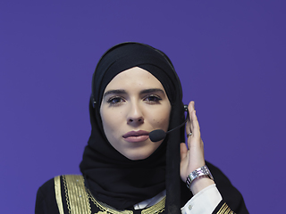 Image showing Portrait of young muslim woman with headphones