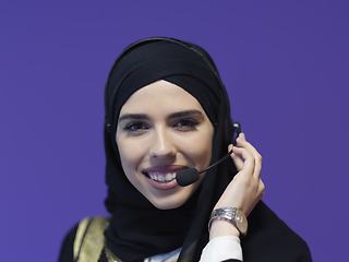 Image showing Portrait of young muslim woman with headphones