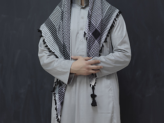 Image showing Portrait of young muslim man wearing traditional clothes