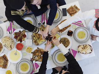 Image showing Top view of Muslim family having iftar together during Ramadan