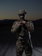 Image showing soldier with full combat gear in night mission