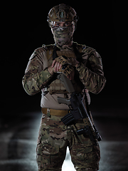 Image showing soldier with full combat gear in night mission