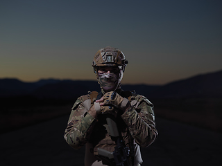 Image showing soldier with full combat gear in night mission