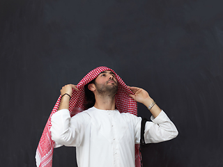 Image showing Portrait of young muslim man wearing traditional clothes