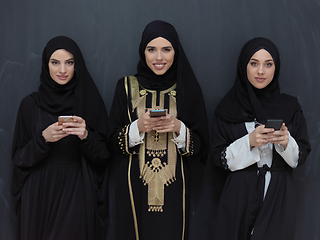 Image showing Portrait of Arab women wearing traditional clothes or abaya