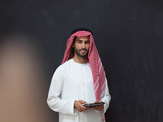 Image showing Portrait of young muslim businessman using tablet