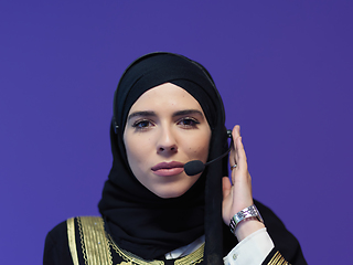 Image showing Portrait of young muslim woman with headphones