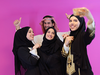 Image showing Portrait of young muslim people in traditional clothes