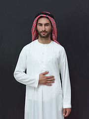 Image showing Portrait of young muslim man wearing traditional clothes