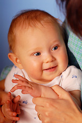 Image showing A girl with her mammy