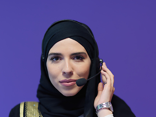 Image showing Portrait of young muslim woman with headphones