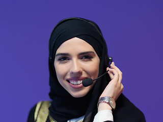 Image showing Portrait of young muslim woman with headphones