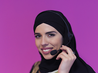Image showing Portrait of young muslim woman with headphones