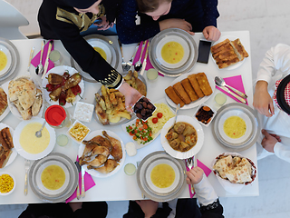 Image showing Top view of Muslim family having iftar together during Ramadan