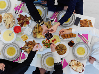 Image showing Top view of Muslim family having iftar together during Ramadan