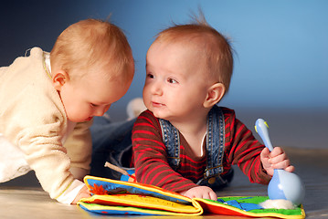 Image showing Babies playing with toys