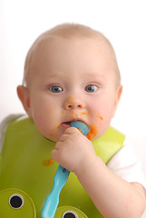 Image showing Feeding of a small child