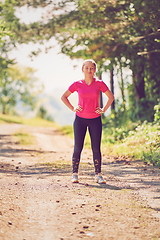 Image showing woman enjoying in a healthy lifestyle while jogging