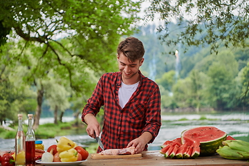 Image showing man cooking tasty food for french dinner party